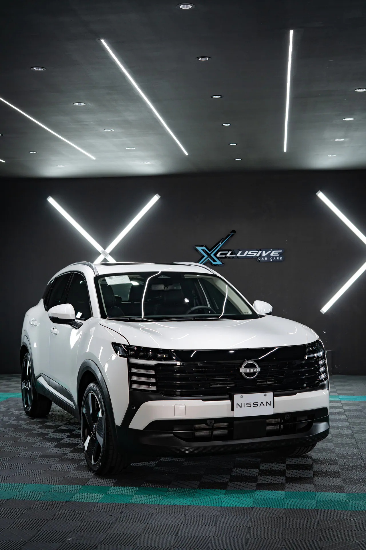 Nissan Kicks blanco en Xclusive Car Care